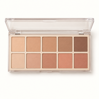 Open nude eyeshadow palette on a warm white background